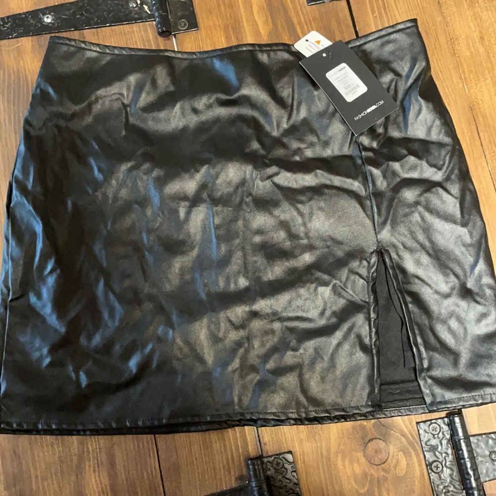 Brand new stretchy pleather skirt. So cute